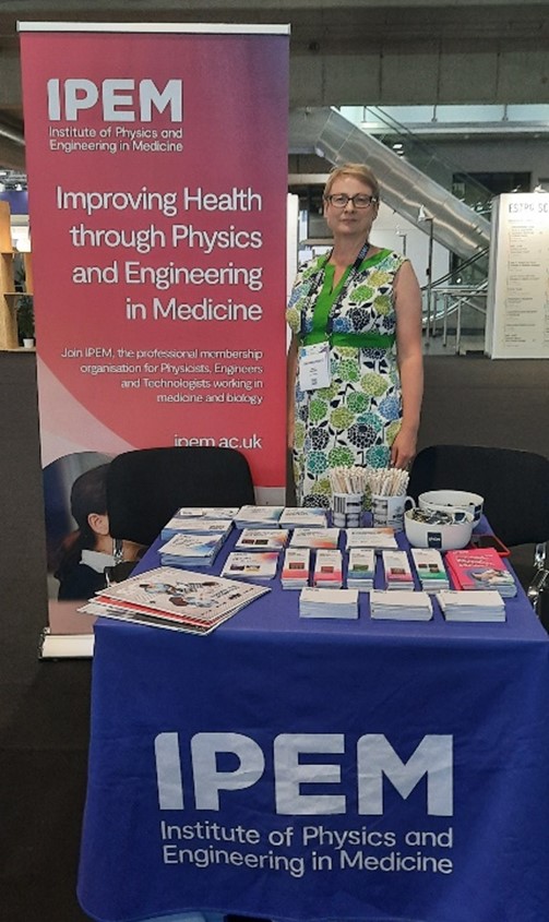 IPEM President Anna Barnes at the IPEM stand at ESTRO 2025